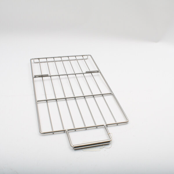 A Montague wire rack with a handle on a white surface.