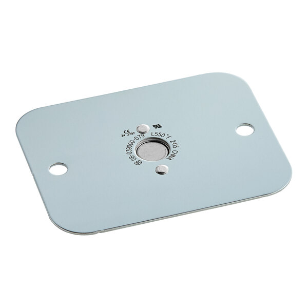 A metal plate with a hole in the center.
