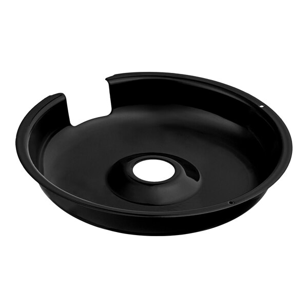 A black circular object with a hole in the middle.