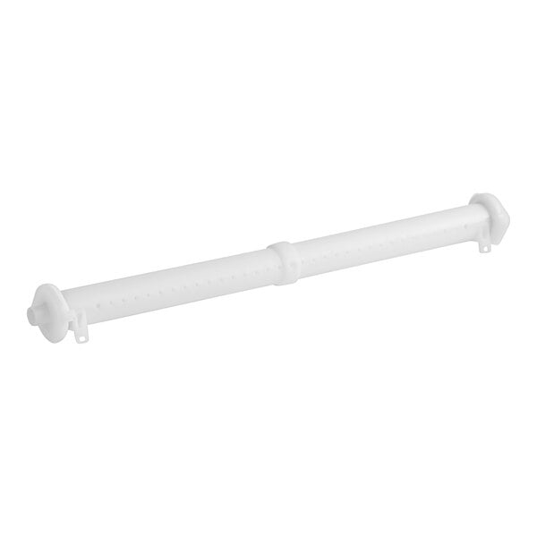 A white plastic Ice-O-Matic distribution tube.