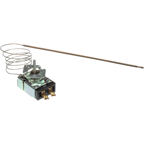 An Atlas Metal Industries Inc 1096-36 thermostat, a small metal device with a wire and a spring.