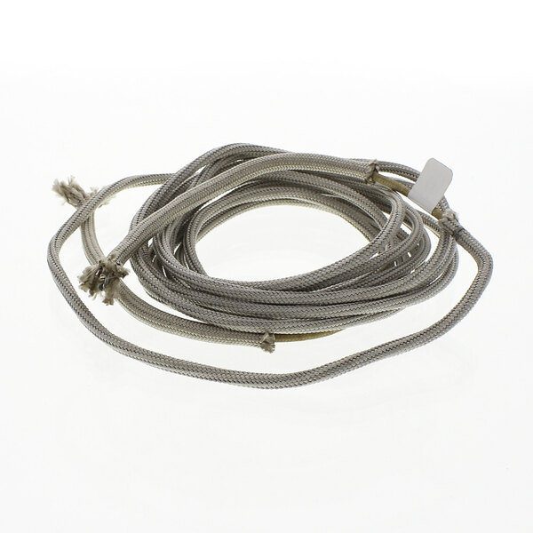 A close up of a Vollrath heating element rope with a silver connector.