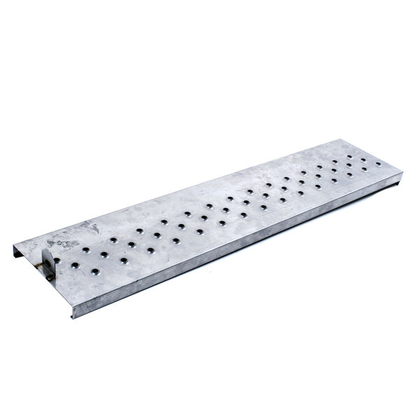 A Middleby Marshall metal plate with holes.