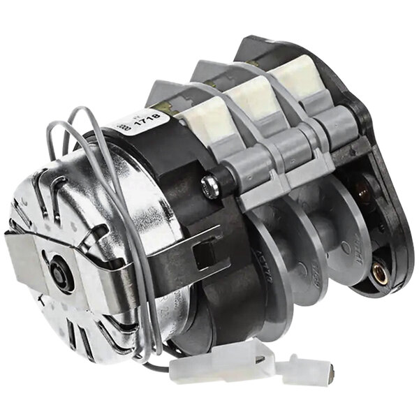 A close-up of a small metal and plastic mechanical device with a white background.