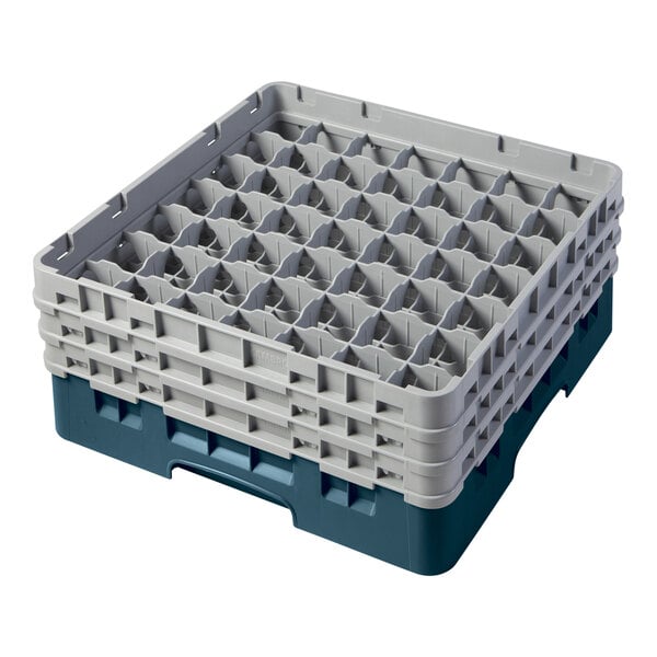A teal and gray glass rack with 49 compartments for washing and storing glassware.