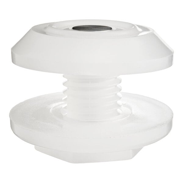 A white plastic threaded component with a round top and bottom, featuring a small metallic disc on the top surface.