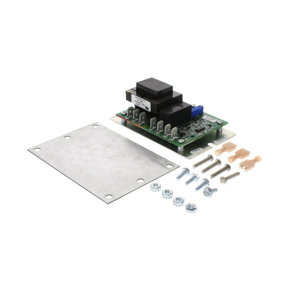 A close-up of a circuit board with screws and bolts attached to a metal plate.