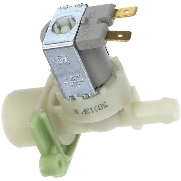 A close-up of a Jet Tech solenoid water valve with a green plug.