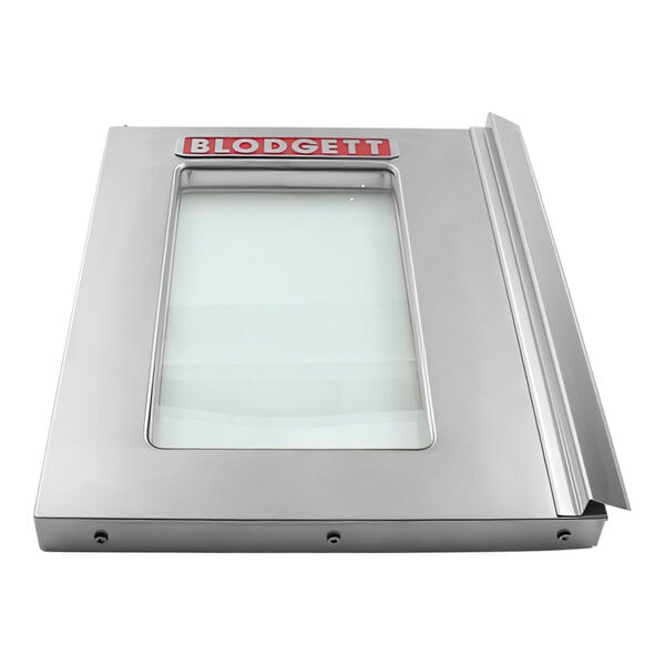 A rectangular silver Blodgett convection oven door with a glass window.