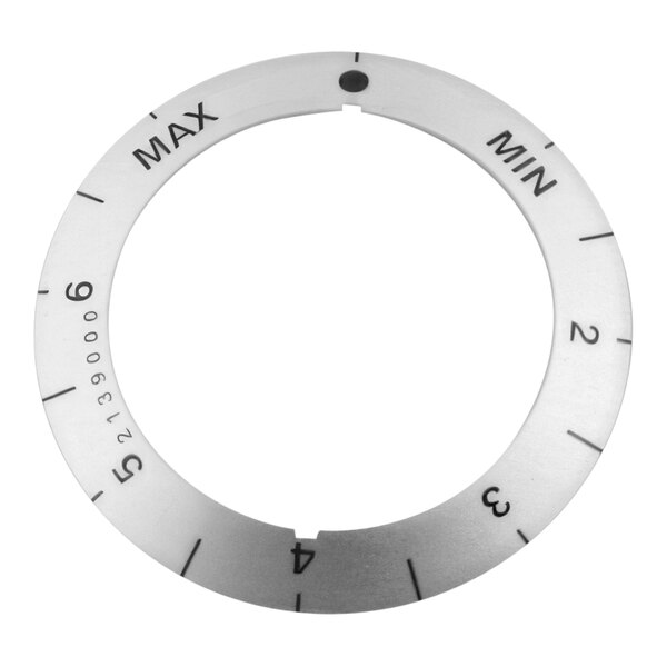A circular white and black dial insert with black numbers.