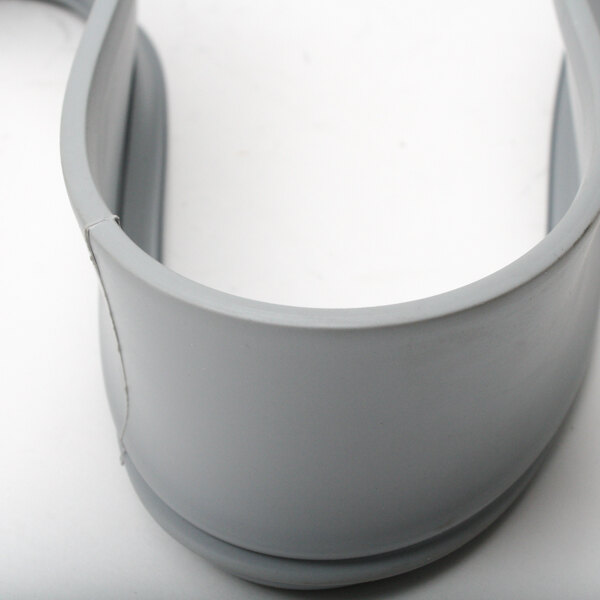 A close up of a grey vinyl gasket with a white background.