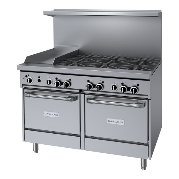 A large stainless steel Garland commercial gas range with six burners.