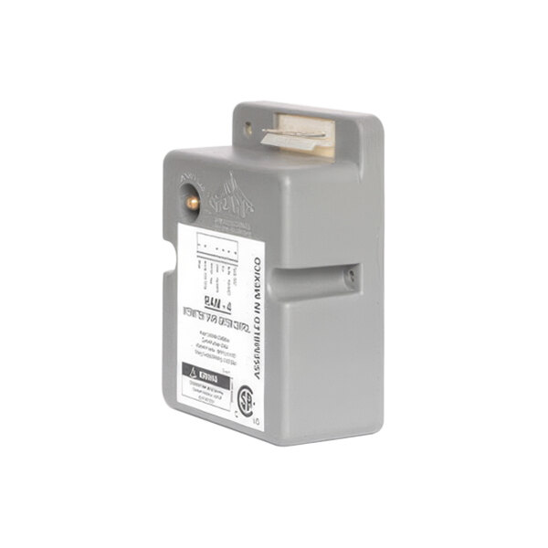 A grey rectangular plastic box with a white label that says "Imperial Spark Module"