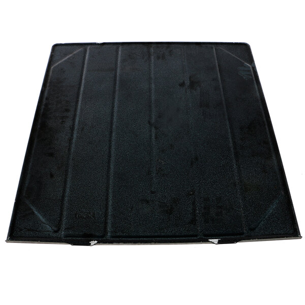 A black rectangular enamel tray with lines on it.