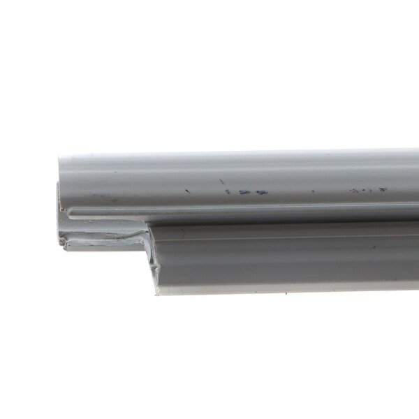 A close-up of a white plastic Beverage-Air gasket bumper.