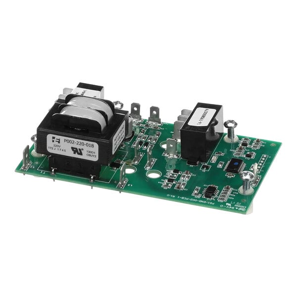 A close-up of a green circuit board with a Crown Steam liquid level control device.