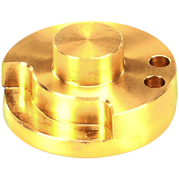 A brass plated Crown Steam rotary disc with holes.