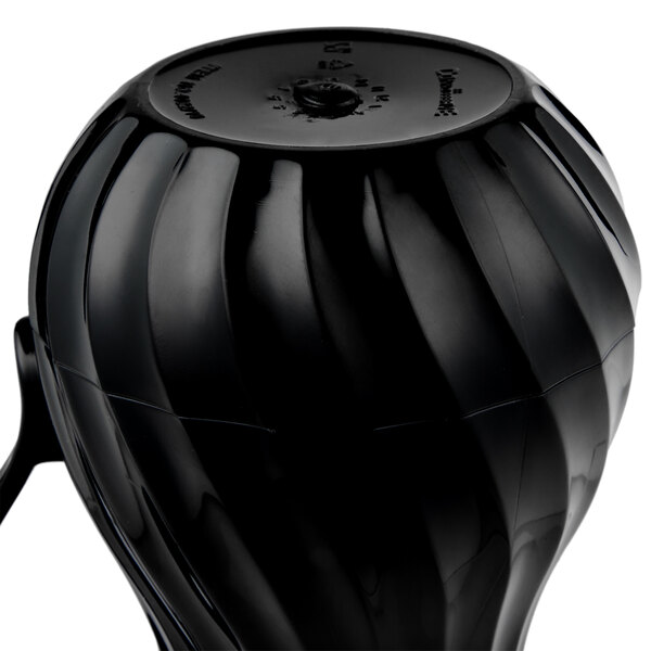 A black plastic container with a handle.