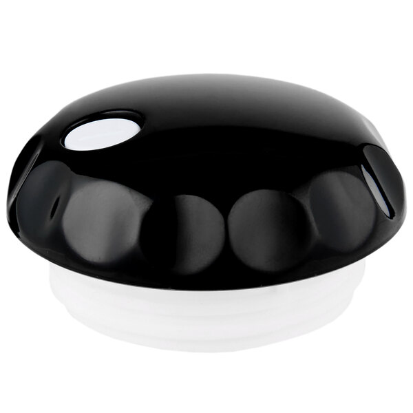 A black and white plastic cap with a white button on a white background.