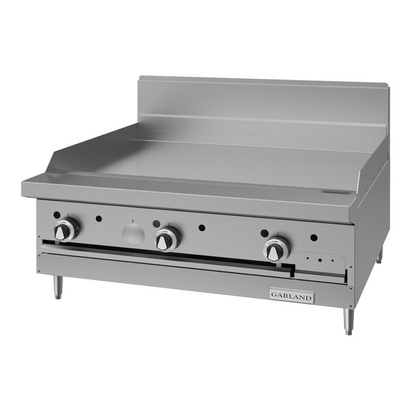 A commercial stainless steel 36-inch griddle range with control knobs and backsplash, designed for liquid propane use.