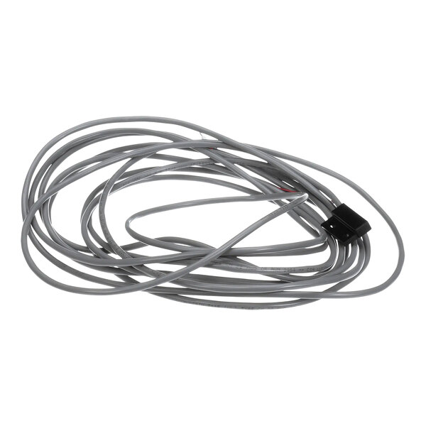 A black rectangular wire with a cable attached.