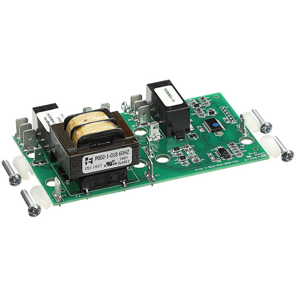 A green Crown Steam liquid level control circuit board with screws.
