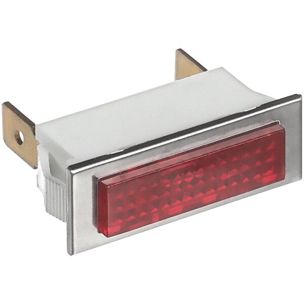 A close-up of a red rectangular light with metal brackets.