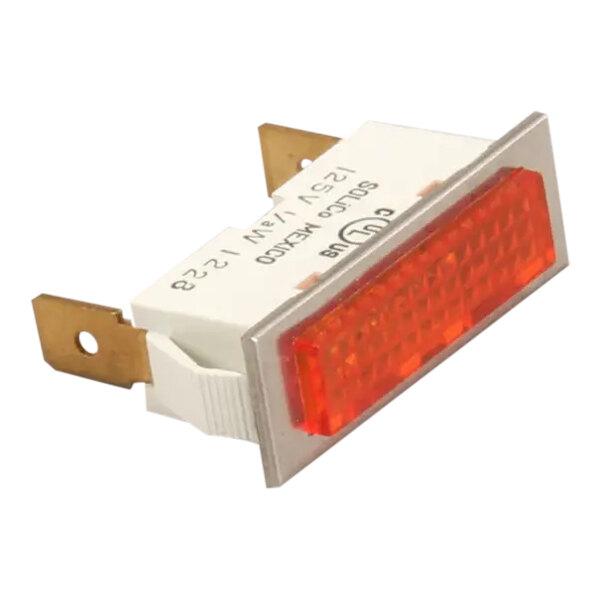A rectangular amber pilot light with metal terminals, used as an indicator component in electrical equipment.
