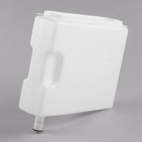 A white plastic Bunn juice container with a handle and black spout.