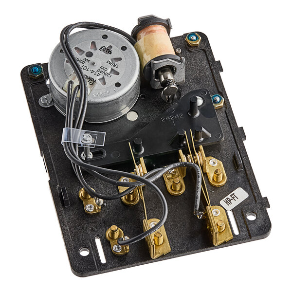 A black and silver Beverage-Air defrost timer with wires and screws.