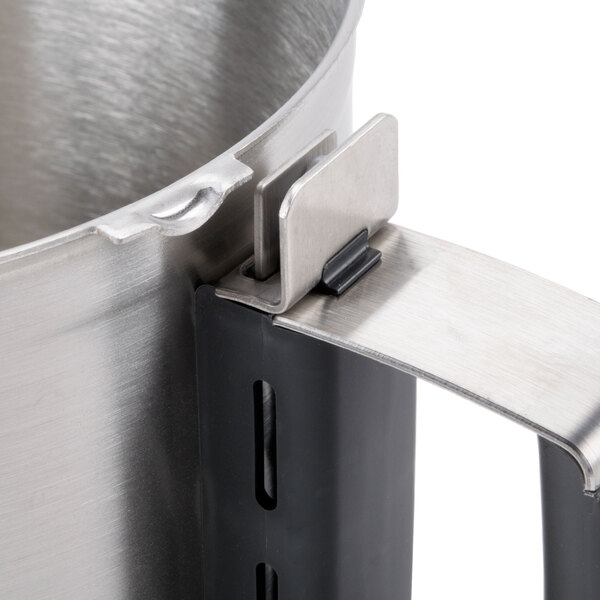 A stainless steel Robot Coupe cutter bowl with a metal handle.