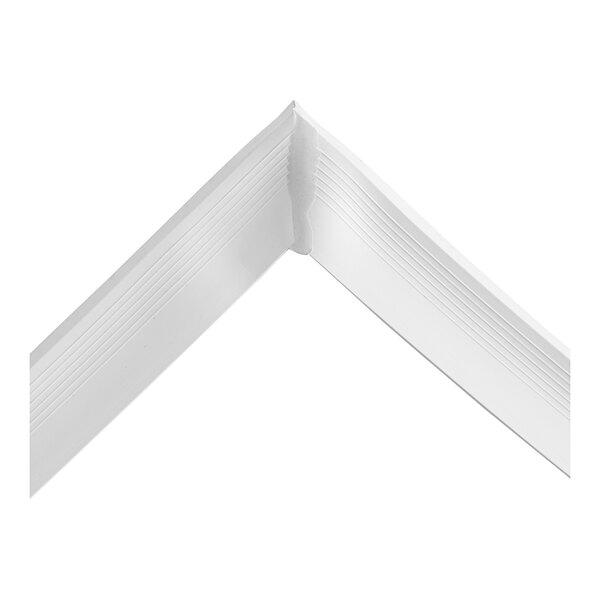 A close-up of a white corner on a white background.
