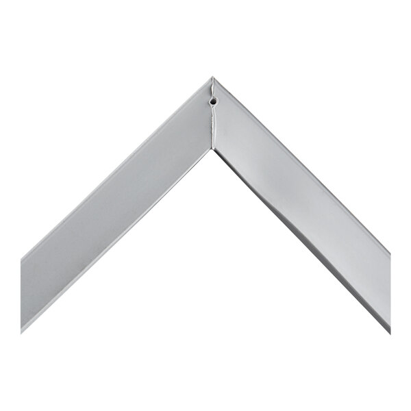 A close-up of a silver metal door gasket.