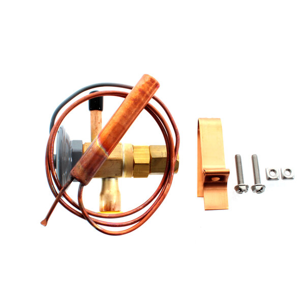 A Master-Bilt copper expansion valve with copper tubes and pipes.