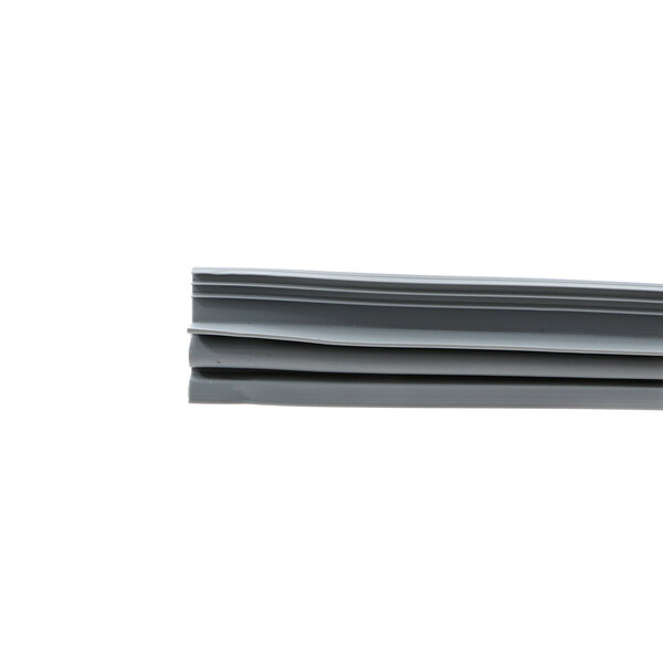 A stack of grey plastic strips.