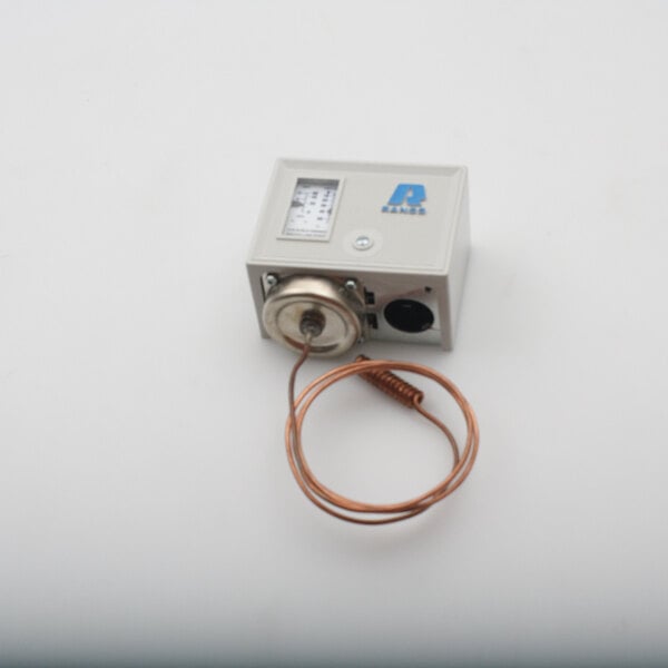 A small white Victory Temperature Control box with a wire attached.