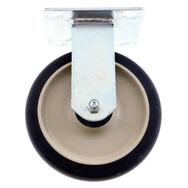 A metal plate with a black rubber wheel.