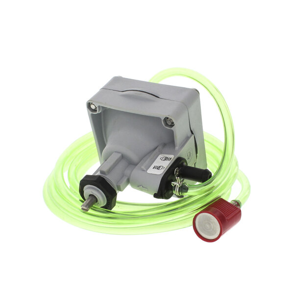A Champion rinse aid pump with a green diaphragm and tubes.