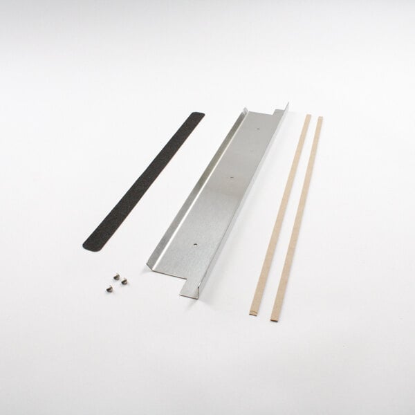 A metal strip with black and white lines.
