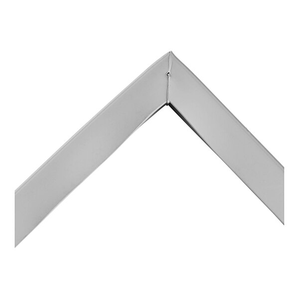 A close-up of a corner of a square metal gasket.