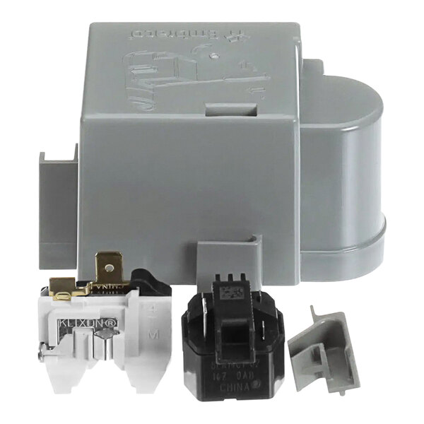 A grey Silver King electrical box with two wires and a connector.