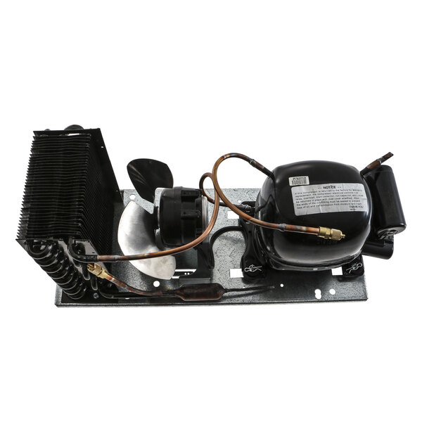 A Beverage-Air condensing unit with wires and a fan.
