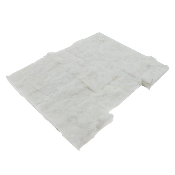 A white piece of foam with white paper on it.