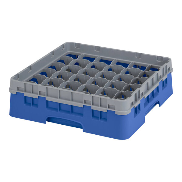 A blue plastic Cambro glass rack with grey extenders.