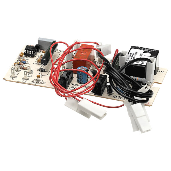 A white circuit board with wires.