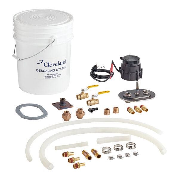 A Cleveland Boiler Service Kit in a bucket of water with other equipment.