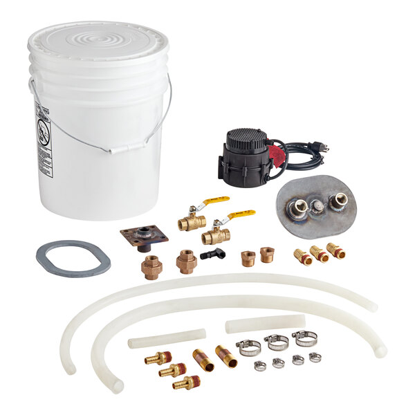 A Cleveland Boiler Service Kit with plumbing parts and a hose in a bucket of water.
