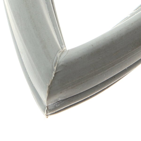 A close up of a corner of a grey plastic frame with a white background.