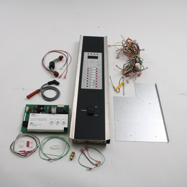 A close-up of a Cleveland control panel with wires and switches.