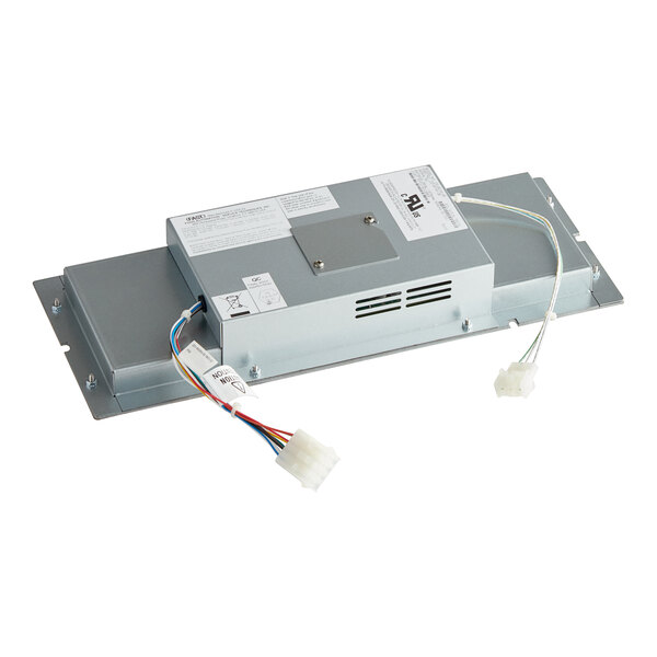 A grey electronic device with wires and a power cord.